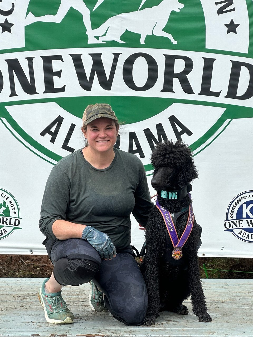 Abigail Kitchens DVM with Enzo at One World Canine Obstacle Course
